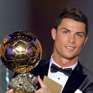 Christiano Ronaldo with the FIFA Ballon d'Or award. Image: The DNA India.