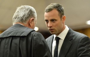 Oscar consulting with his Lawyer, Roux. (Photo: Times Live)