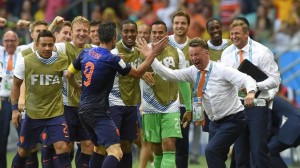 Nan Persie celebrates his brilliant header with Coach Van Gaal. Photo: Yahoo Sports.